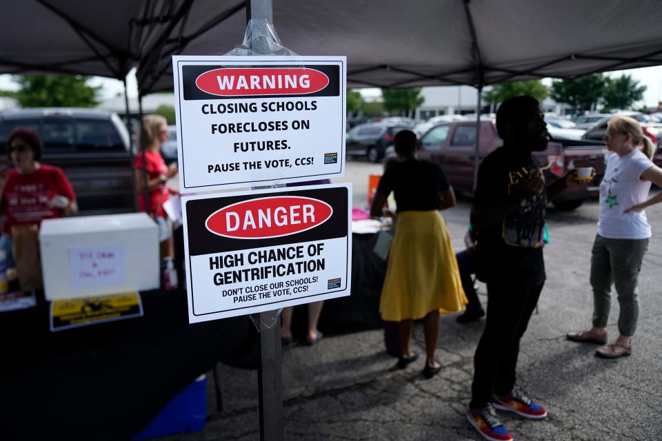 Opponents of school closures and consolidation rally Tuesday before a Columbus City school board meeting where the Superintendent's Community Facilities Task Force made its recommendations to the board.