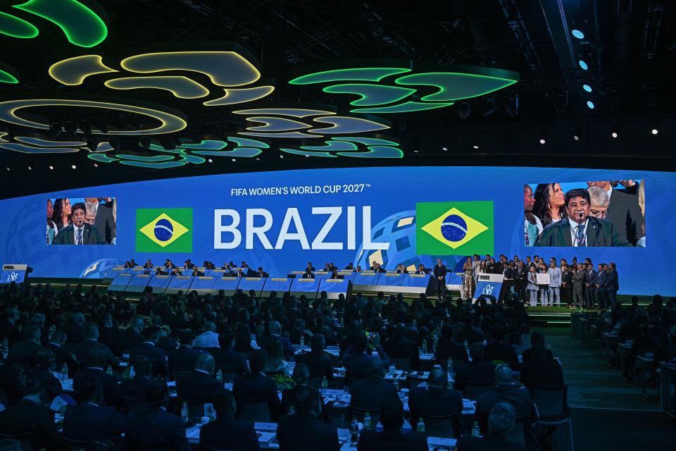 Brazilian Football Association President Ednaldo Rodrigues is surrounded by his delegation as he makes a speech after Brazil wins its bid to host the 2027 Women's World Cup during the 74th FIFA Congress in Bangkok on May 17, 2024.