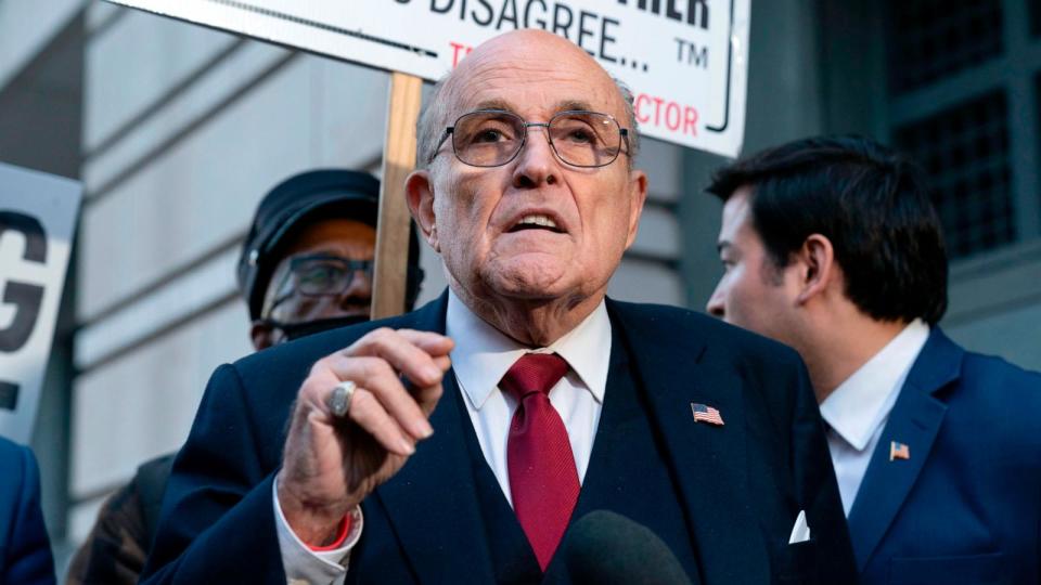 PHOTO: Former Mayor of New York Rudy Giuliani speaks during a news conference outside the federal courthouse in Washington, Dec. 15, 2023. (Jose Luis Magana/AP)