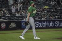 Oakland Athletics' A.J. Puk returns to the mound after his pitch struck New York Yankees batter Anthony Rizzo in the seventh inning of a baseball game, Monday, June 27, 2022, in New York. (AP Photo/Bebeto Matthews)