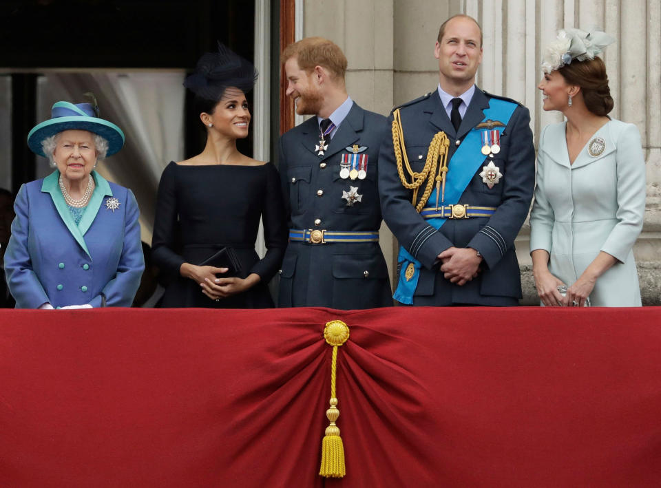 Queen Elizabeth, the Duchess and Duke of Sussex, and the Duke and Duchess of Cambridge gather on the Buckingham Palace balcony in July.