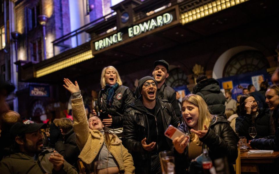 A group of people sing Happy Birthday while enjoying drinks on Old Compton Street in Soho - Rob Pinney/Getty Images Europe