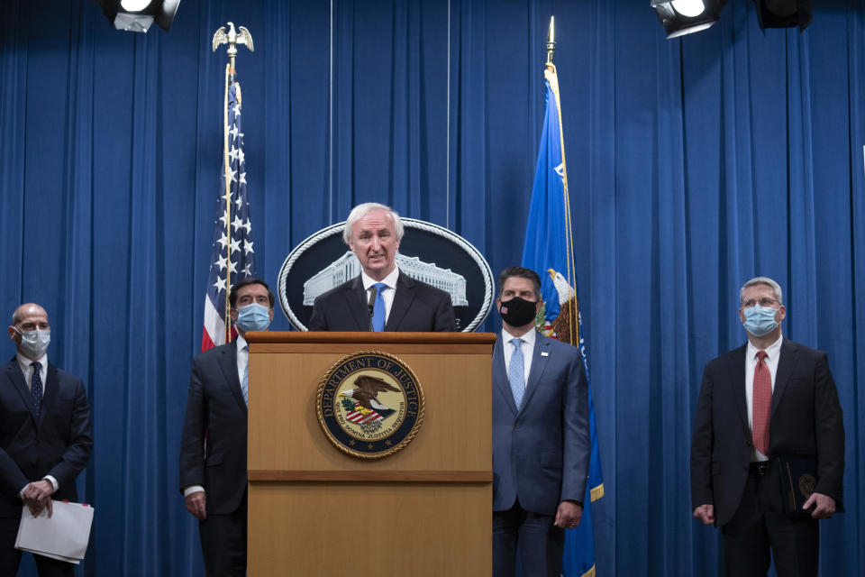 Deputy Attorney General Jeffery Rosen speaks, Wednesday, Sept. 16, 2020 at the Justice Department in Washington. The Justice Department has charged five Chinese citizens with hacks targeting more than 100 companies and institutions in the United States and abroad, including social media and video game companies as well as universities and telecommunications providers. Officials announced the prosecution on Wednesday. (Tasos Katopodis/Pool via AP)