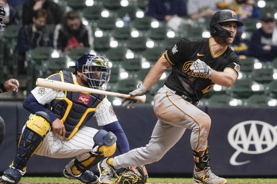 Pittsburgh Pirates' Adam Frazier hits a two-run scoring triple during the fifth inning of a baseball game against the Milwaukee Brewers Friday, April 16, 2021, in Milwaukee. (AP Photo/Morry Gash)