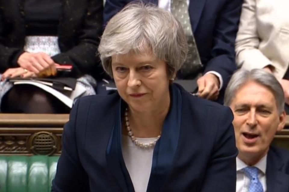 Defeat: Theresa May after the vote (EPA)