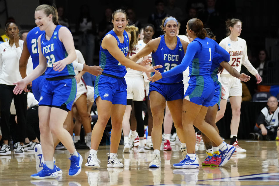 Florida Gulf Coast players react after winning a college basketball game against the Washington State in the NCAA Tournament, Saturday, March 18, 2023, in Villanova, Pa. (AP Photo/Matt Rourke)