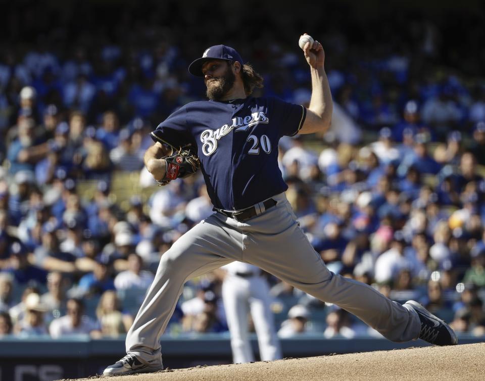 Milwaukee Brewers starting pitcher Wade Miley throws during the first inning of Game 5 of the National League Championship Series baseball game against the Los Angeles Dodgers Wednesday, Oct. 17, 2018, in Los Angeles. (AP Photo/Matt Slocum)