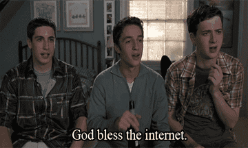 Three young men sitting, looking excitedly at the camera, with text "God bless the internet" below them