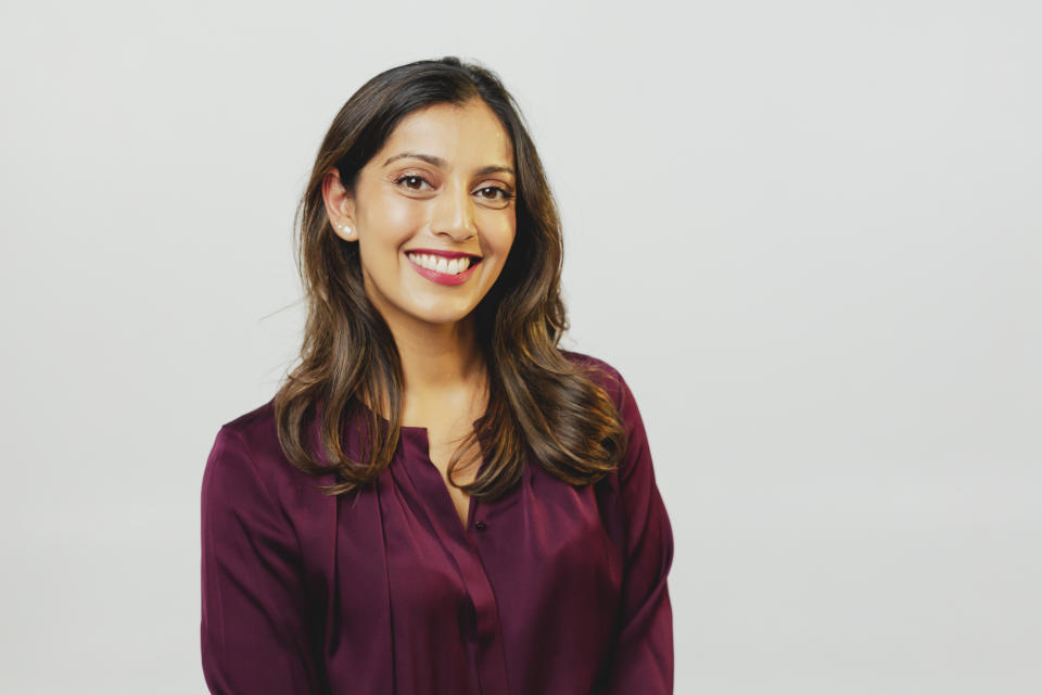 A headshot of Dr Shreya Andric wearing a burgundy blouse