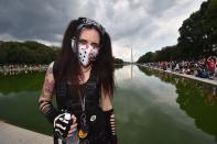 <p>Fans of the US rap group Insane Clown Posse, known as Juggalos, protest on September 16, 2017 in front of the Lincoln Memorial in Washington, D.C. against a 2011 FBI decision to classify their movement as a gang. (Photo: Paul J. Richards/AFP/Getty Images) </p>