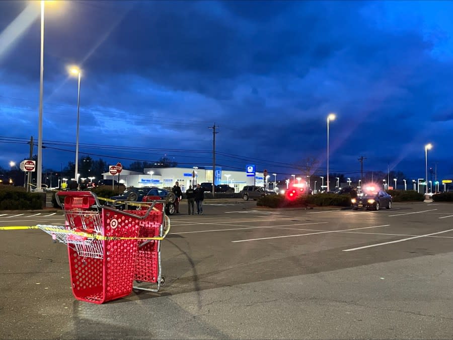 Police can be seen in the Target parking on Friday with the area closed off.