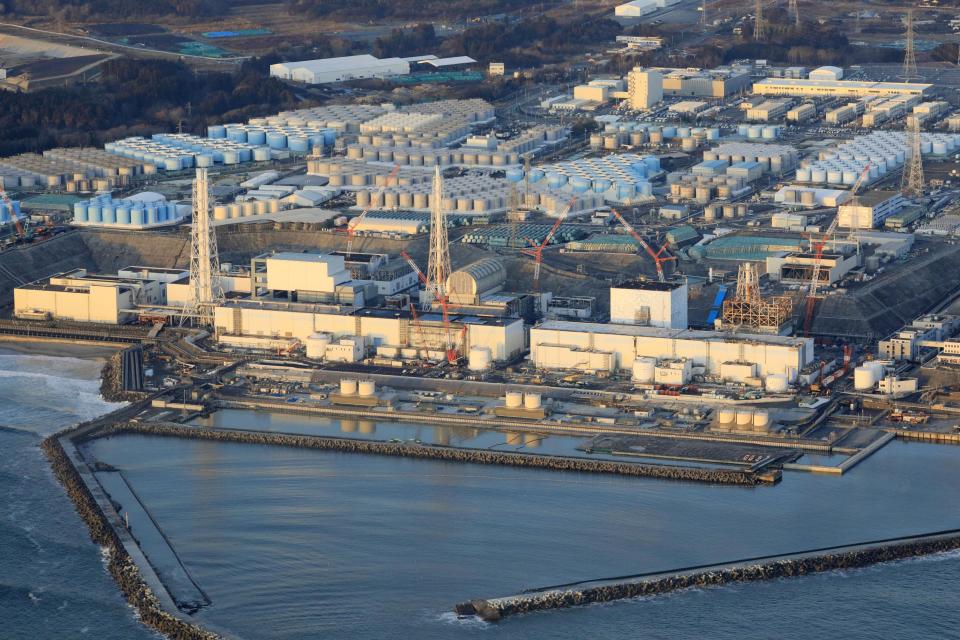 This aerial photo shows the Fukushima Dai-ichi nuclear power plant operated by Tokyo Electric Power Company (TEPCO) in Okuma town, Fukushima prefecture, northeastern Japan, on Feb. 14, 2021, a day after a strong earthquake. TEPCO says both of two seismometers at Unit 3, one of three melted reactors, had been out of order since last week and were not able to collect data when the powerful earthquake struck the area on Feb. 13, calling into question if the company's risk management has improved since the disaster. (Hironori Asakawa/Kyodo News via AP)