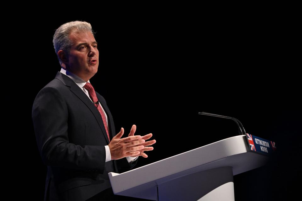 Britain's Justice Secretary Brandon Lewis delivers a speech (AFP via Getty Images)