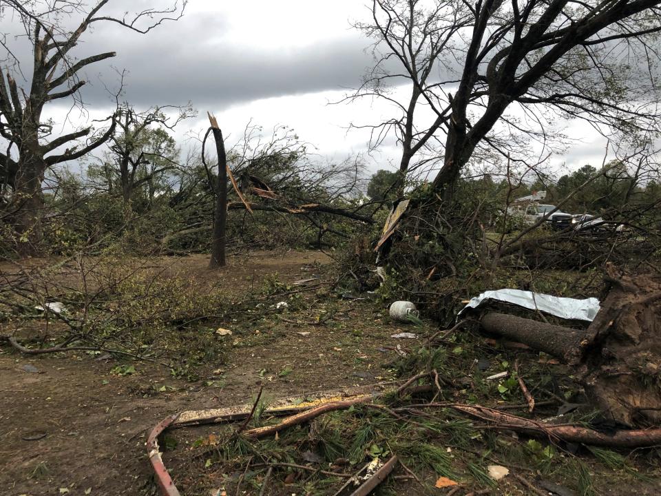 Scenes of devastation are visible in all directions along Lamar County Road 35940, west of State Highway 271, after a massive tornado hit the area, causing extensive damage and destroying an unknown number of homes, Friday, Nov. 4, 2022, in Powderly, Texas.