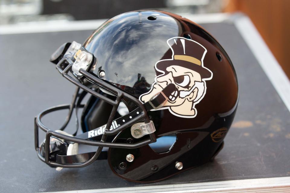 Sept. 30, 2017; Winston-Salem, NC, USA; A closeup view of a Wake Forest Demon Deacons helmet during the game against the <a class="link " href="https://sports.yahoo.com/ncaaf/teams/florida-st/" data-i13n="sec:content-canvas;subsec:anchor_text;elm:context_link" data-ylk="slk:Florida State Seminoles;sec:content-canvas;subsec:anchor_text;elm:context_link;itc:0">Florida State Seminoles</a> at BB&T Field. Jeremy Brevard-USA TODAY Sports
