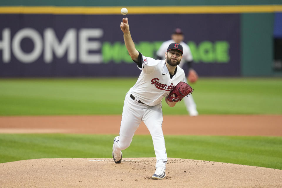 Cleveland Guardians' Lucas Giolito pitches to a Cincinnati Reds batter during the first inning of a baseball game Tuesday, Sept. 26, 2023, in Cleveland. (AP Photo/Sue Ogrocki)