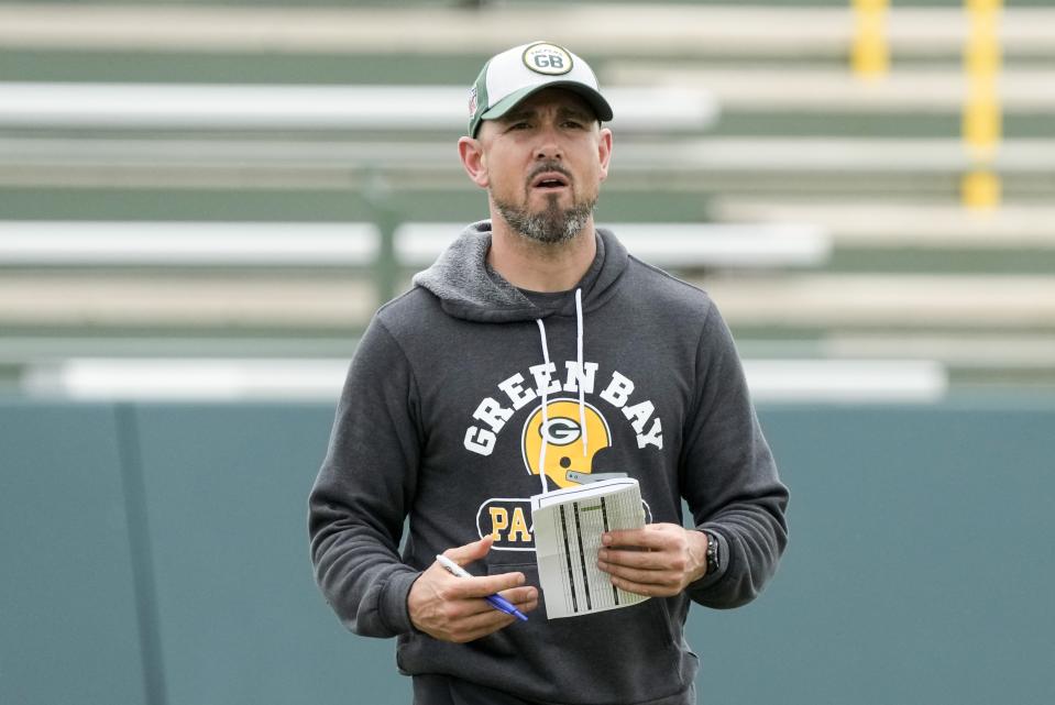 Green Bay Packers' head coach Matt LaFleur watches during an NFL football OTA practice session Wednesday, May 31, 2023, in Green Bay, Wis. (AP Photo/Morry Gash)