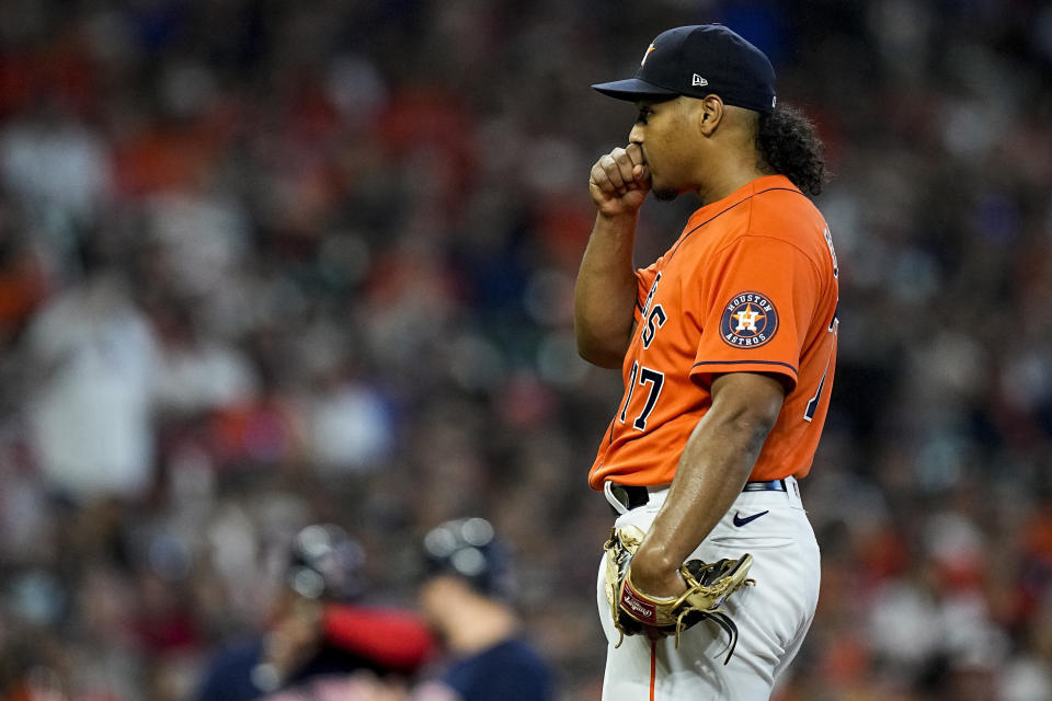 Houston Astros starting pitcher Luis Garcia loads the bases during the first inning in Game 2 of baseball's American League Championship Series against the Boston Red Sox Saturday, Oct. 16, 2021, in Houston. (AP Photo/David J. Phillip)