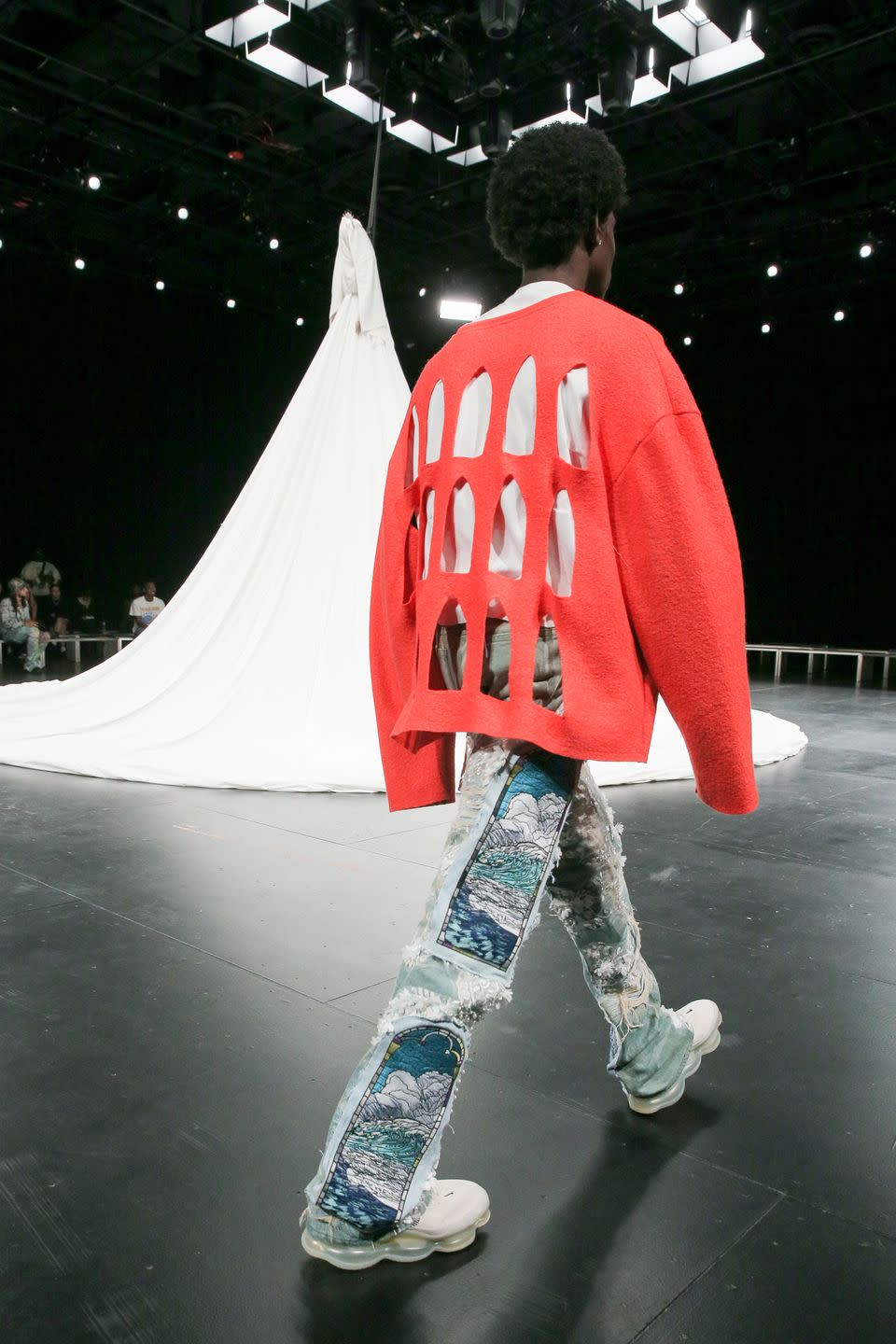 4) The Sistine Surfboard Sweater at Who Designs War