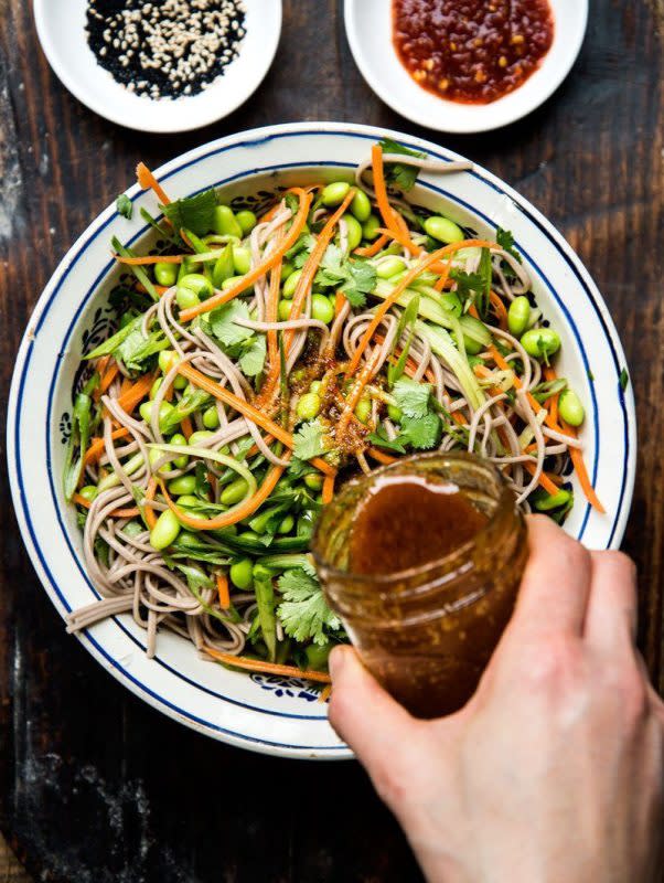 <p>A quick, cold, buckwheat soba noodle salad with an assortment of vegetables and herbs prepared in a manner of minutes.</p><p><strong>Get the recipe: <a href="https://honestcooking.com/buckwheat-soba-noodle-salad-chili-dressing/" rel="nofollow noopener" target="_blank" data-ylk="slk:Buckwheat Soba Noodle Salad with Chili Dressing;elm:context_link;itc:0;sec:content-canvas" class="link "><em>Buckwheat Soba Noodle Salad with Chili Dressing</em></a></strong></p>