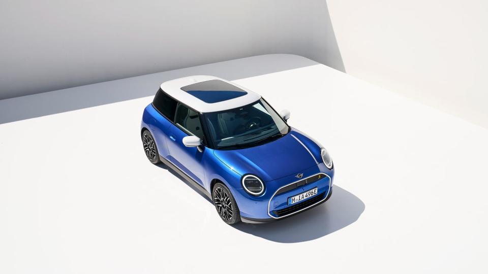 2025 mini cooper electric lineup in ocean blue with white interior