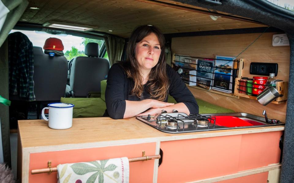 Taylor's van includes a sofa bed and a kitchen unit with a sink and gas hob, which cost her a total of £2,500