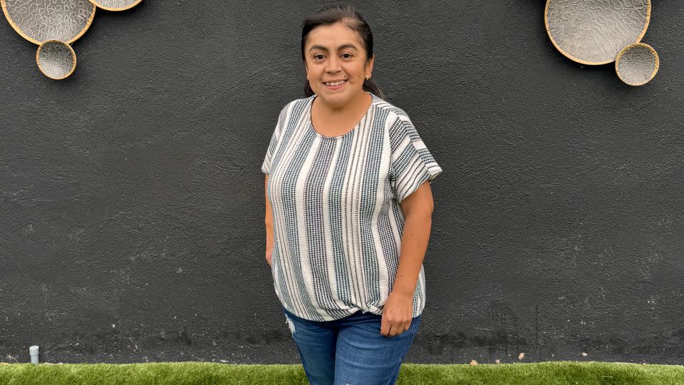 Nathaly Paola Castro Torres, 42, has Laron syndrome, which stunts her height but provides her body with protection from major disease. - Sandra Torres