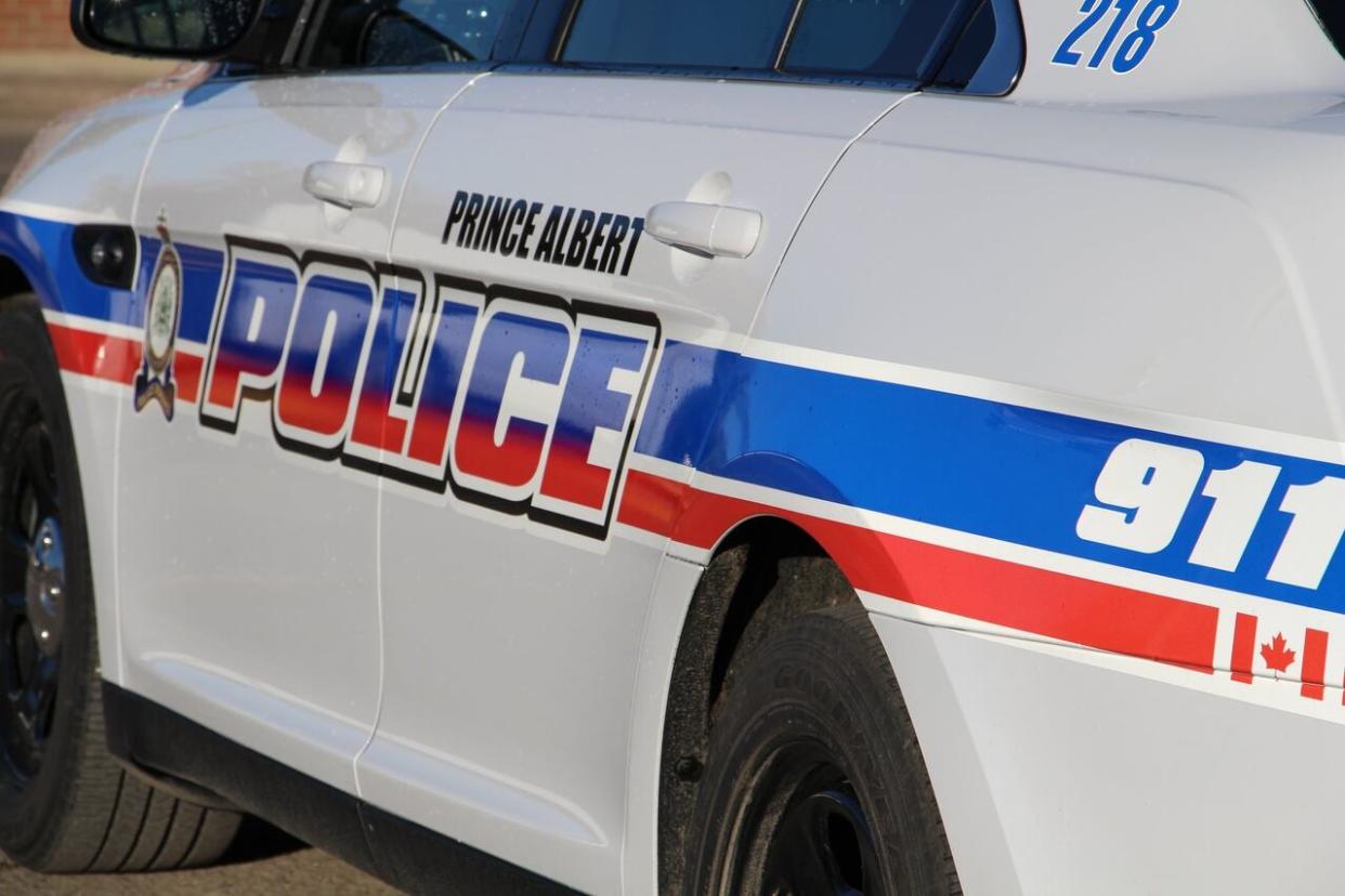 The Prince Albert Police Service warns the public against opening doors of police vehicles without being asked to do so. (Prince Albert Police Service - image credit)