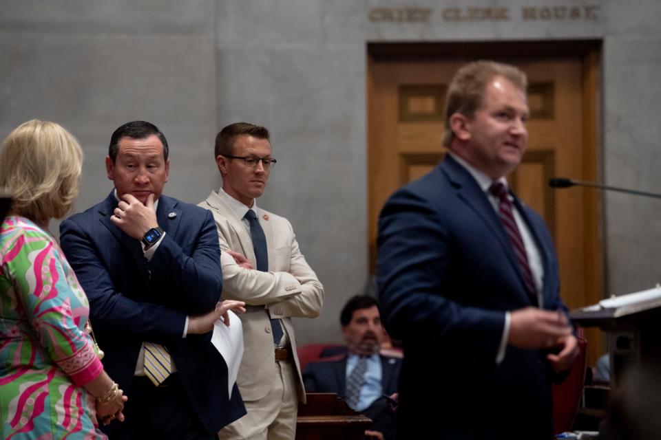 Rep. Patsy Hazlewood, Signal Mountain, Rep. Gary Hicks R- Rogersivlle, Rep. Mark Cochran, Englewood, listen while House Majority Leader William Lamberth, R-Portland, discusses a bill on the last day of session at the Tennessee Capitol in Nashville, Tenn., Thursday, April 25, 2024.