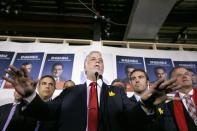 Liberal leader Philippe Couillard gestures as he speaks to supporters at a campaign stop in Laval, Quebec April 4, 2014. Quebec voters will go to the polls in a provincial election April 7. REUTERS/Christinne Muschi (CANADA - Tags: POLITICS)