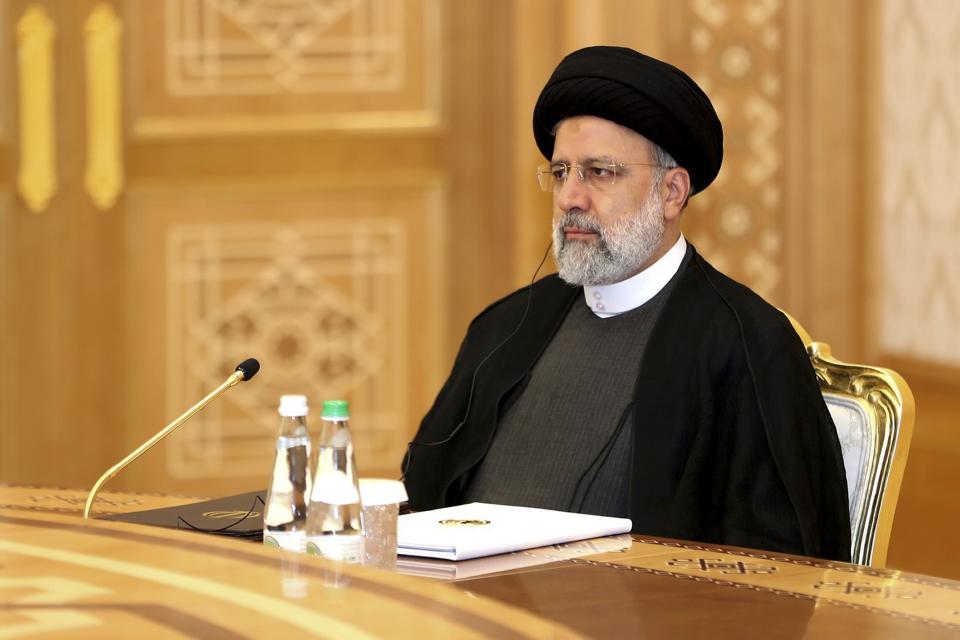 In this handout photo released by the Kremlin Press Service, Iran's President Ebrahim Raisi attends the summit of Caspian Sea littoral states in Ashgabat, Turkmenistan, Wednesday, June 29, 2022. (Kremlin Press Service via AP)