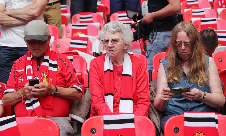 Football Soccer Britain - Leicester City v Manchester United - FA Community Shield - Wembley Stadium - 7/8/16 Manchester United fans before the match Reuters / Eddie Keogh Livepic EDITORIAL USE ONLY. No use with unauthorized audio, video, data, fixture lists, club/league logos or "live" services. Online in-match use limited to 45 images, no video emulation. No use in betting, games or single club/league/player publications. Please contact your account representative for further details.