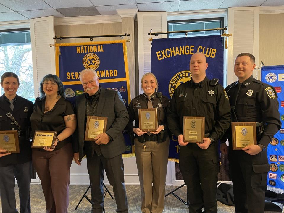 The honorees at this year's Exchange Club of Monroe Law Day were (from left): Trooper Samantha Hill, Central Dispatch Supervisor Niki Bomia, Officer Joe Schumaker, Deputy Melissa Henderson, Corrections Officer Charles Galloway and Officer Peyton Smithers.
