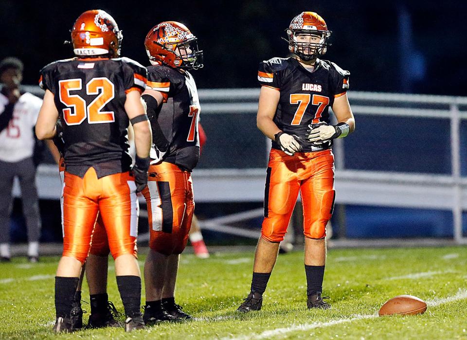 Lucas High School's Brayden Spitler (77) is seen on the field against Plymouth High Schoo during high school football action at Lucas High School Friday, Oct. 6, 2023. TOM E. PUSKAR