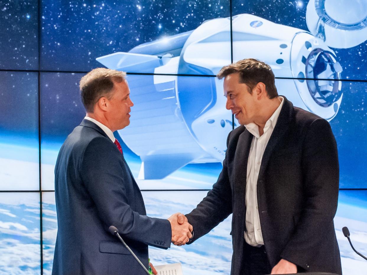 jim bridenstine nasa administrator elon musk spacex ceo crew dragon demo1 demo 1 mission briefing march 2 2019 kennedy space center ksc cape canaveral florida DCM_1281