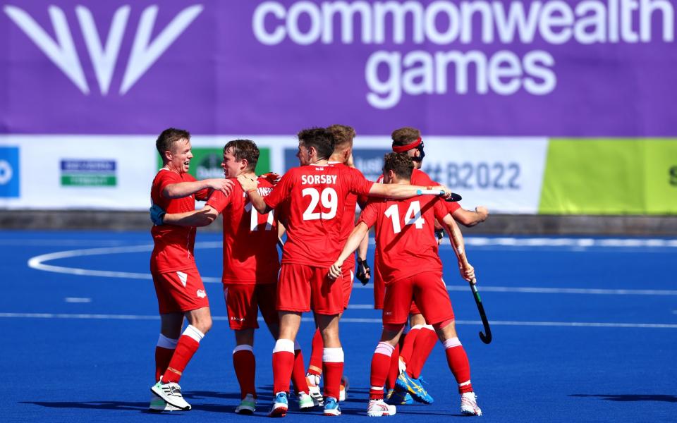 Team England celebrate winning the bronze medal in the Men's Hockey - Getty