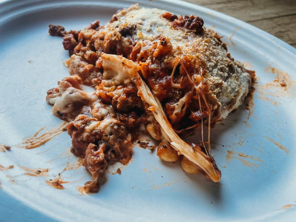 sloppy plate of cooked lasagna