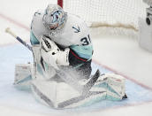 Seattle Kraken goaltender Philipp Grubauer makes a save in the third period of Game 7 of an NHL first-round playoff series against the Colorado Avalanche Sunday, April 30, 2023, in Denver. The Kraken won 2-1 to advance to the next round. (AP Photo/David Zalubowski)