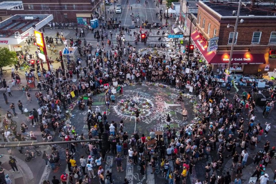 Protesters gather near a memorial in honor of George Floyd in Minneapolis, Minnesota, in June.