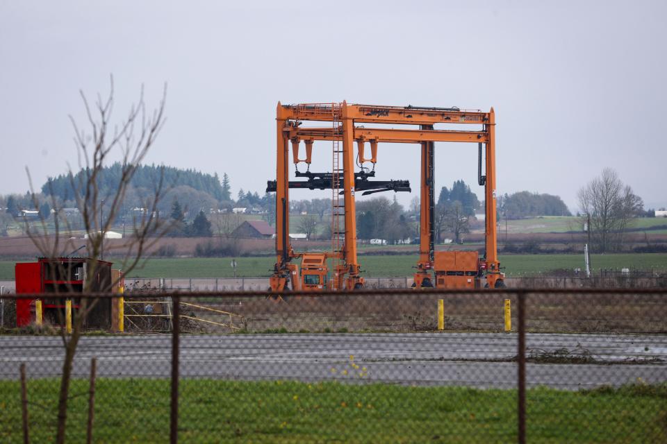 The gantry crane spans the railroad tracks at the Mid-Willamette Valley Intermodal Center in Millersburg.