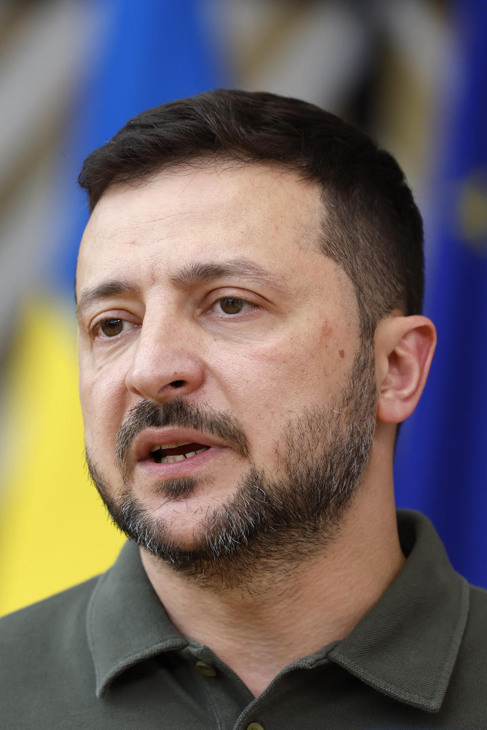 Ukraine's President Volodymyr Zelenskyy speaks with the media as he arrives for an EU summit in Brussels, Thursday, June 27, 2024. European Union leaders are expected on Thursday to discuss the next EU top jobs, as well as the situation in the Middle East and Ukraine, security and defence and EU competitiveness. (AP Photo/Geert Vanden Wijngaert)