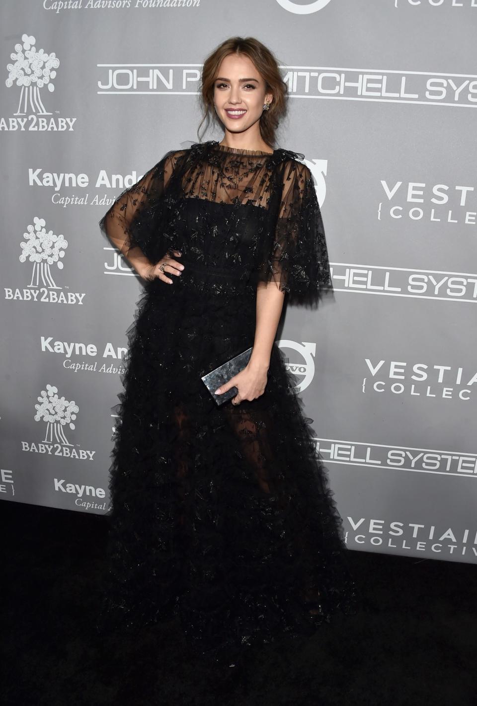 <p>Jessica Alba looked simply gorgeous in an exquisite black Valentino gown. <i>[Photo: Getty]</i> </p>