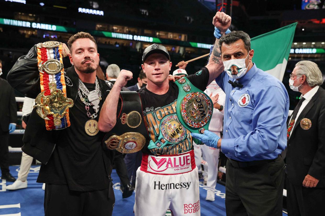 Saul Alvarez celebrates his victory in Miami (Getty)