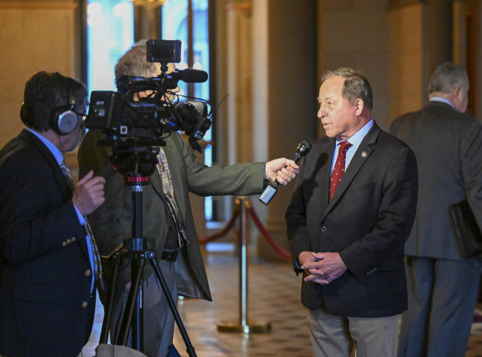 Assemblyman Stephen Hawley, R-Albion, talks with reporters after debating legislation to approve a legislative pay raise during a special legislative session at the state Capitol, Thursday, Dec. 22, 2022, in Albany, N.Y. (AP Photo/Hans Pennink)