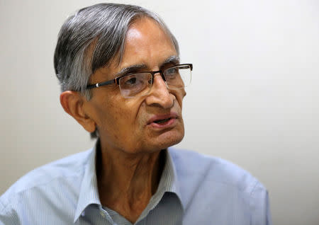 D.C. Anjaria, former independent director on Gujarat International Finance Tec-City (GIFT) board, speaks with Reuters inside his office in Ahmedabad, March 19, 2019. REUTERS/Amit Dave