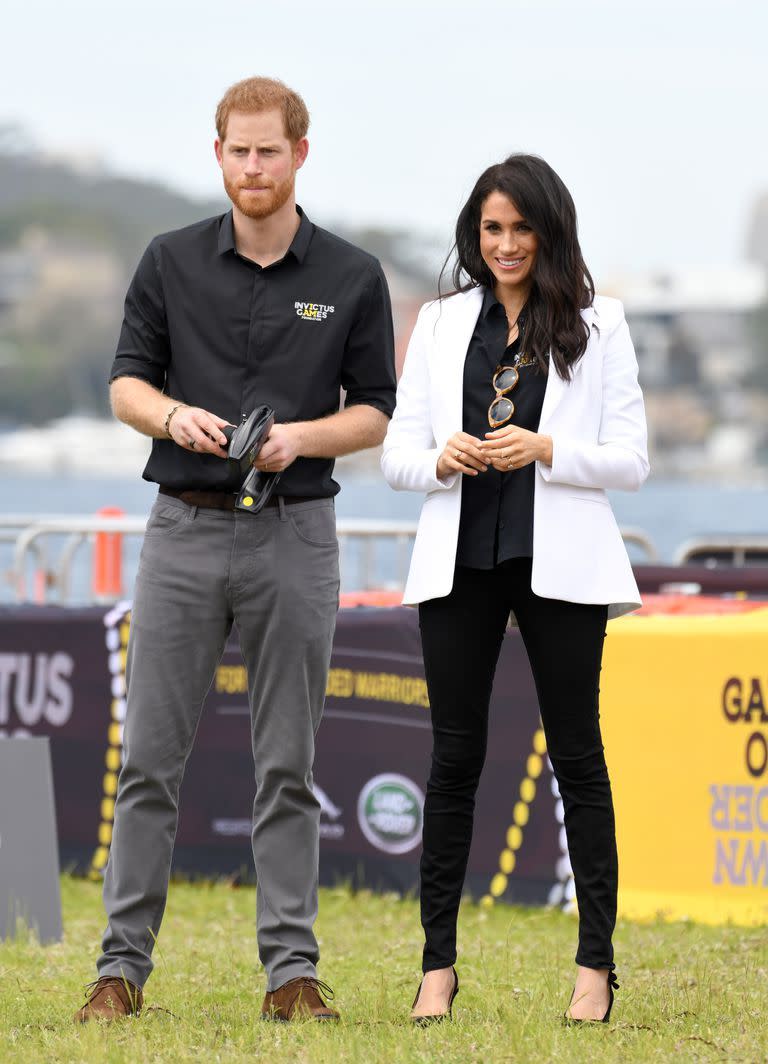 <p>For an event at the 2018 Invictus Games, Meghan wore a tailored white <a href="https://www.net-a-porter.com/gb/en/Shop/Designers/Altuzarra?pn=1&npp=60&image_view=product&dScroll=0" rel="nofollow noopener" target="_blank" data-ylk="slk:Altuzarra blazer;elm:context_link;itc:0;sec:content-canvas" class="link ">Altuzarra blazer</a> from the brand's 2018 collection. She teamed the look with a pair of slim-cut black <a href="https://www.saksfifthavenue.com/search/EndecaSearch.jsp?bmArch=bmForm&bmArch=bmIsForm&bmArch=bmSingle&bmArch=bmHidden&bmArch=bmHidden&bmForm=endeca_search_form_one&bmIsForm=true&bmHidden=submit-search&bmHidden=N_Dim&bmHidden=Ntk&bmHidden=Ntk&bmHidden=Ntx&bmHidden=Ntx&bmHidden=PA&bmSingle=N_Dim&N_Dim=0&Ntk=Entire+Site&Ntx=mode%2Bmatchpartialmax&PA=TRUE&SearchString=Mother+Denim+%27Looker%27+jeans" rel="nofollow noopener" target="_blank" data-ylk="slk:Mother Denim 'Looker' jeans;elm:context_link;itc:0;sec:content-canvas" class="link ">Mother Denim 'Looker' jeans</a>and a pair of black pointed-toe, slingback <a href="https://www.bloomingdales.com/shop/product/tabitha-simmons-womens-millie-slingback-pointed-toe-pumps?ID=2956738&PartnerID=LINKSHAREUK&cm_mmc=LINKSHAREUK-_-n-_-n-_-n&ranMID=37206&ranEAID=QFGLnEolOWg&ranSiteID=QFGLnEolOWg-c3ovlG8MK8U_ALWx5J4nMw&LinkshareID=QFGLnEolOWg-c3ovlG8MK8U_ALWx5J4nMw&ranPublisherID=QFGLnEolOWg&ranLinkID=886932904612&ranLinkTypeID=15&intnl=true" rel="nofollow noopener" target="_blank" data-ylk="slk:Tabitha Simmons 'Millie' pumps;elm:context_link;itc:0;sec:content-canvas" class="link ">Tabitha Simmons 'Millie' pumps</a> with a bow.</p><p>For the occasion, Meghan wore a tailored white <a href="https://www.net-a-porter.com/gb/en/Shop/Designers/Altuzarra?pn=1&npp=60&image_view=product&dScroll=0" rel="nofollow noopener" target="_blank" data-ylk="slk:Altuzarra blazer;elm:context_link;itc:0;sec:content-canvas" class="link ">Altuzarra blazer</a> from the brand's 2018 collection. She teamed the look with a pair of slim-cut black <a href="https://www.saksfifthavenue.com/search/EndecaSearch.jsp?bmArch=bmForm&bmArch=bmIsForm&bmArch=bmSingle&bmArch=bmHidden&bmArch=bmHidden&bmForm=endeca_search_form_one&bmIsForm=true&bmHidden=submit-search&bmHidden=N_Dim&bmHidden=Ntk&bmHidden=Ntk&bmHidden=Ntx&bmHidden=Ntx&bmHidden=PA&bmSingle=N_Dim&N_Dim=0&Ntk=Entire+Site&Ntx=mode%2Bmatchpartialmax&PA=TRUE&SearchString=Mother+Denim+%27Looker%27+jeans" rel="nofollow noopener" target="_blank" data-ylk="slk:Mother Denim 'Looker' jeans;elm:context_link;itc:0;sec:content-canvas" class="link ">Mother Denim 'Looker' jeans</a>and a pair of black pointed-toe, slingback <a href="https://www.bloomingdales.com/shop/product/tabitha-simmons-womens-millie-slingback-pointed-toe-pumps?ID=2956738&PartnerID=LINKSHAREUK&cm_mmc=LINKSHAREUK-_-n-_-n-_-n&ranMID=37206&ranEAID=QFGLnEolOWg&ranSiteID=QFGLnEolOWg-c3ovlG8MK8U_ALWx5J4nMw&LinkshareID=QFGLnEolOWg-c3ovlG8MK8U_ALWx5J4nMw&ranPublisherID=QFGLnEolOWg&ranLinkID=886932904612&ranLinkTypeID=15&intnl=true" rel="nofollow noopener" target="_blank" data-ylk="slk:Tabitha Simmons 'Millie' pumps;elm:context_link;itc:0;sec:content-canvas" class="link ">Tabitha Simmons 'Millie' pumps</a> with a bow.</p>