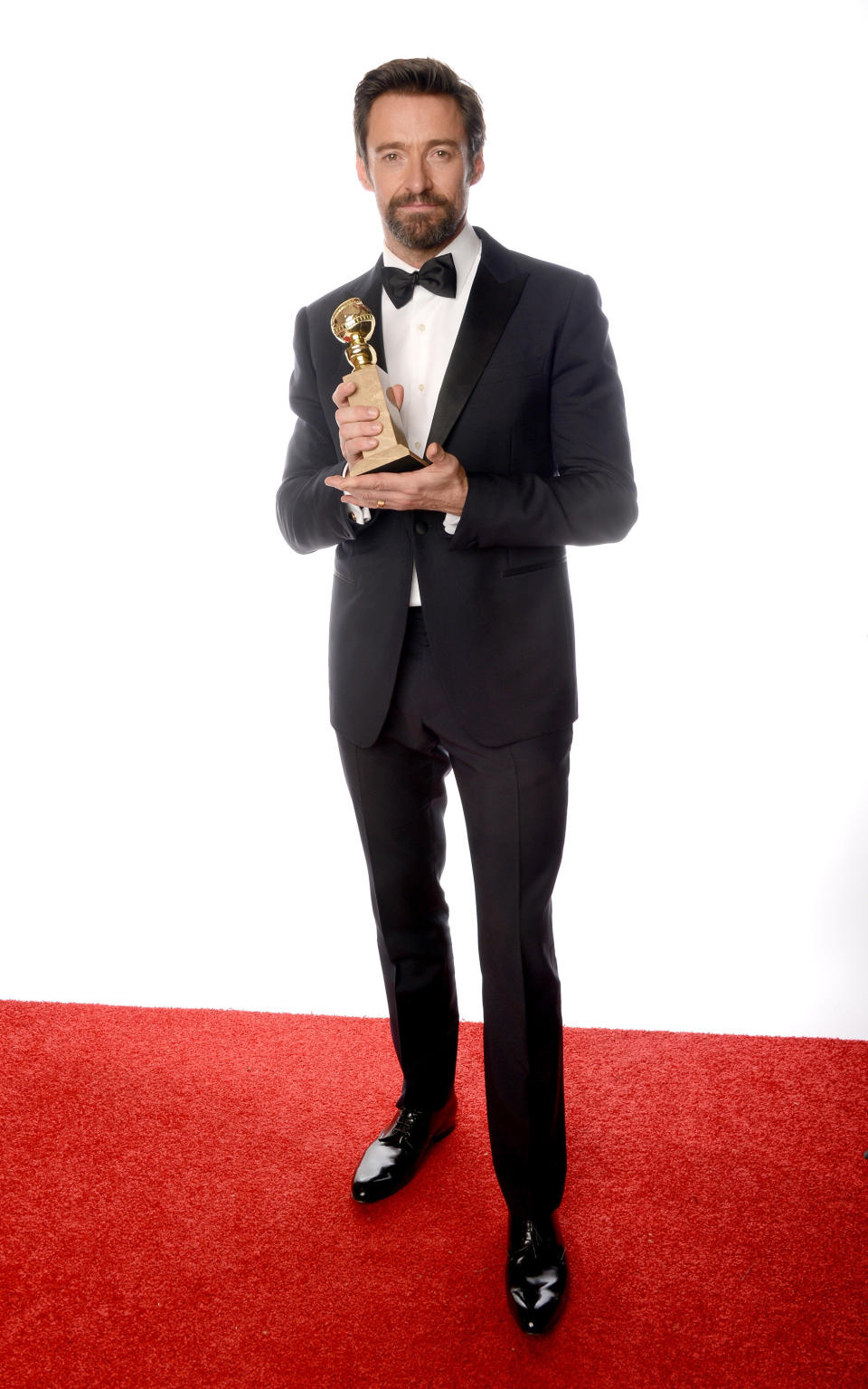 BEVERLY HILLS, CA - JANUARY 13:  Actor Hugh Jackman, winner of the Best Performance by an Actor in a Motion Picture - Comedy Or Musical Award for 'Les Miserables' poses for a portrait at the 70th Annual Golden Globe Awards held at The Beverly Hilton Hotel on January 13, 2013 in Beverly Hills, California.  (Photo by Dimitrios Kambouris/Getty Images)