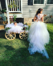 <p>The reality star’s daughter with Eason, Ensley, who was born in January, was too young to walk down the aisle herself, so the little flower girl had a special ride. “The flowers girls killed it,” reported Evans. (Photo: <a rel="nofollow noopener" href="https://www.instagram.com/p/BZdhPxRgvfG/?hl=en&taken-by=j_evans1219" target="_blank" data-ylk="slk:Jenelle Evans via Instagram;elm:context_link;itc:0;sec:content-canvas" class="link ">Jenelle Evans via Instagram</a>)<br><br></p>