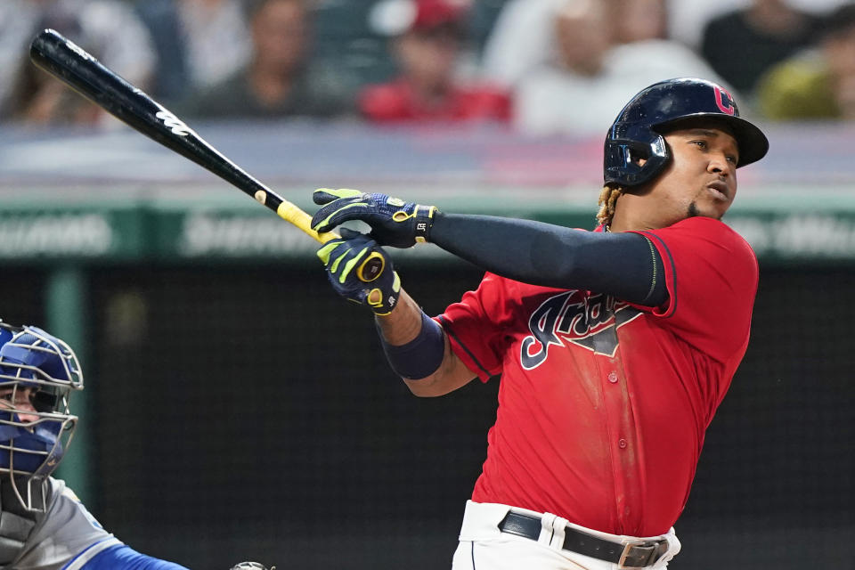 Cleveland Indians' Jose Ramirez watches his solo home run during the eighth inning of the team's baseball game against the Kansas City Royals, Saturday, July 10, 2021, in Cleveland. The Indians won 14-6. (AP Photo/Tony Dejak)