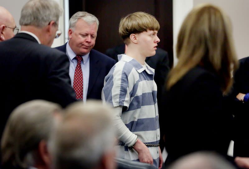 Dylann Roof is escorted into the court room at the Charleston County Judicial Center to enter his guilty plea on murder charges in state court for the 2015 shooting massacre at a historic black church, in Charleston